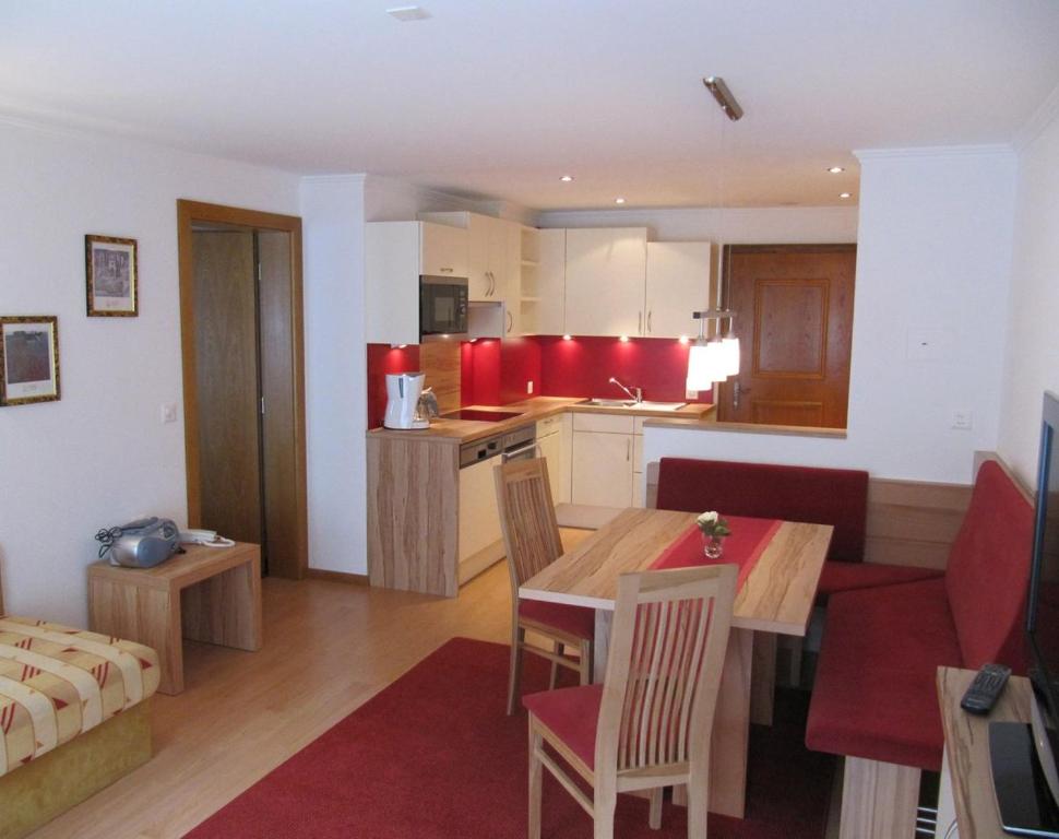 Kuchyň nebo kuchyňský kout v ubytování Soliva Hotel & Apartments