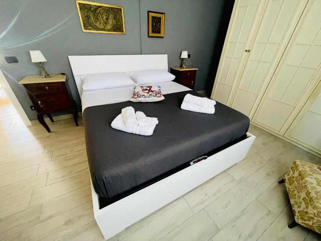 Postel nebo postele na pokoji v ubytování Casa Nettuno