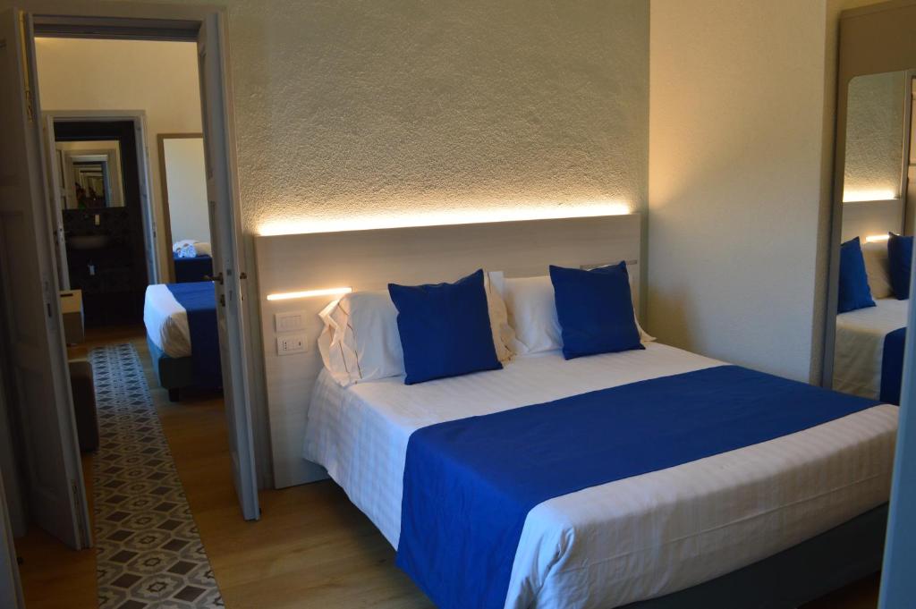 Postel nebo postele na pokoji v ubytování TANIT ROOMS & SPA