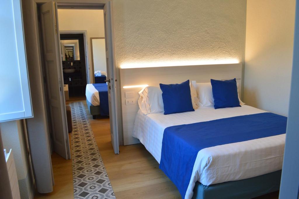 Postel nebo postele na pokoji v ubytování TANIT ROOMS & SPA