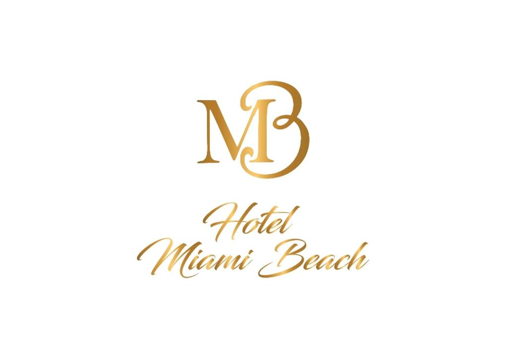 litera n początkowe logo podpisu marathi w obiekcie Hotel Miami Beach w mieście Golem