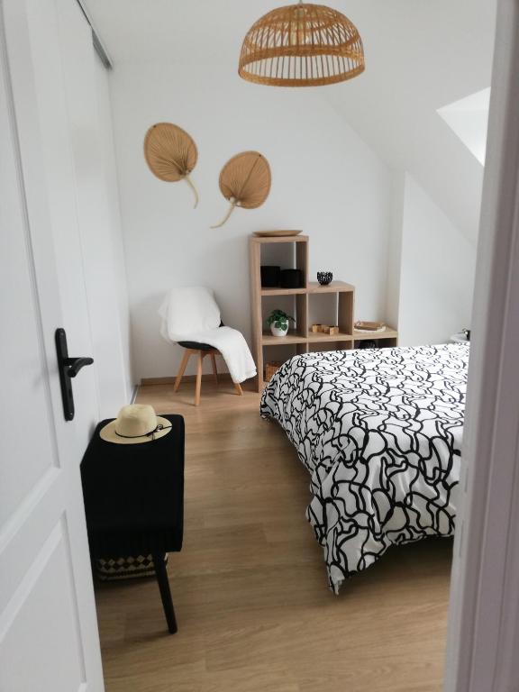 Postel nebo postele na pokoji v ubytování Chambre d'hôtes chez Marie