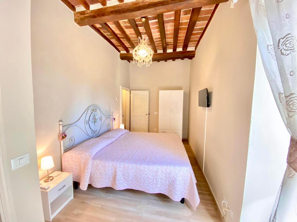 Posteľ alebo postele v izbe v ubytovaní Casa Ambra