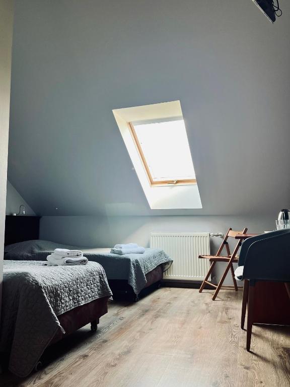 Postel nebo postele na pokoji v ubytování Motel Orzeł