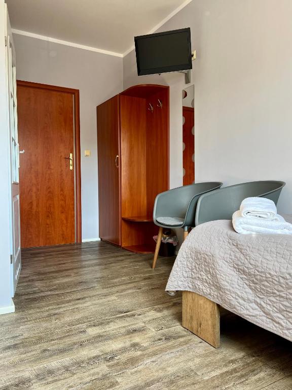 Postel nebo postele na pokoji v ubytování Motel Orzeł