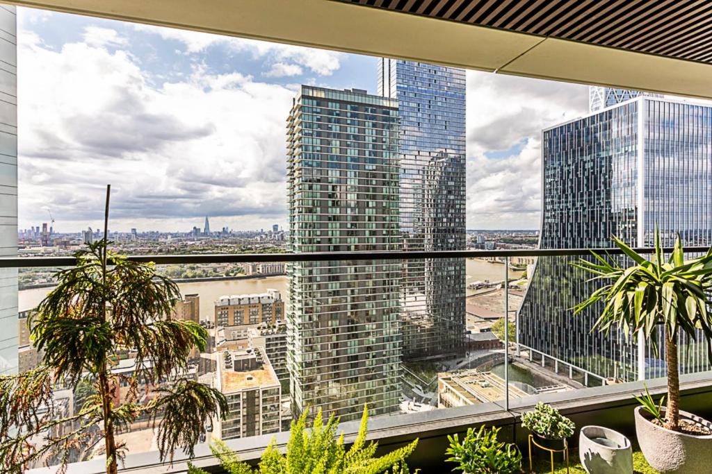 a view of a city from a building at Canary Wharf City Escape 1-Bed Apartment in London