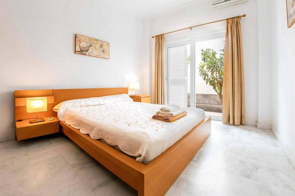 Postel nebo postele na pokoji v ubytování Villa Royal Sunset