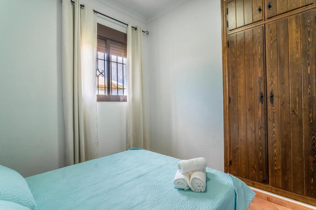 Postel nebo postele na pokoji v ubytování EntreCalas 2 Chalet con piscina privada en Conil, Roche viejo, cala del aceite