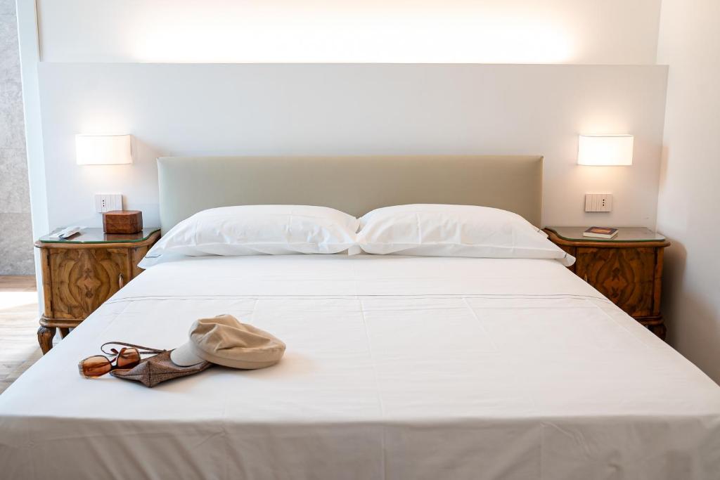 Letto o letti in una camera di Villa Tosati