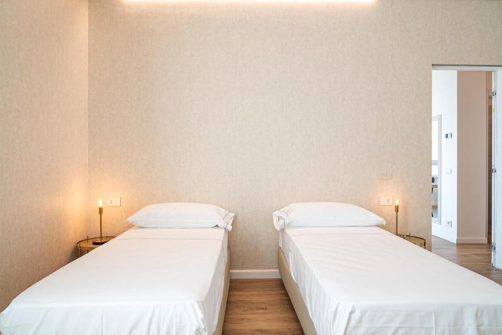 Letto o letti in una camera di Villa Tosati