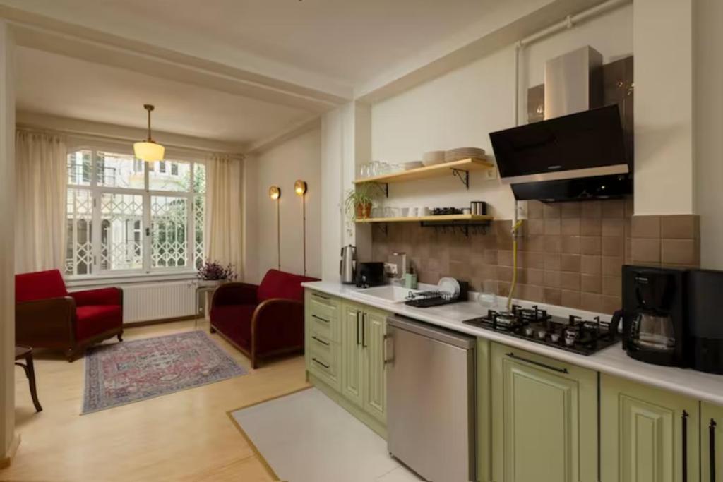 Kuchyň nebo kuchyňský kout v ubytování Lemon Apartments