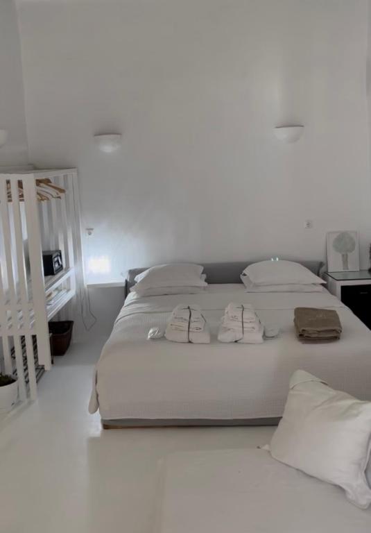 Posteľ alebo postele v izbe v ubytovaní SAO Smallport Naoussa Paros