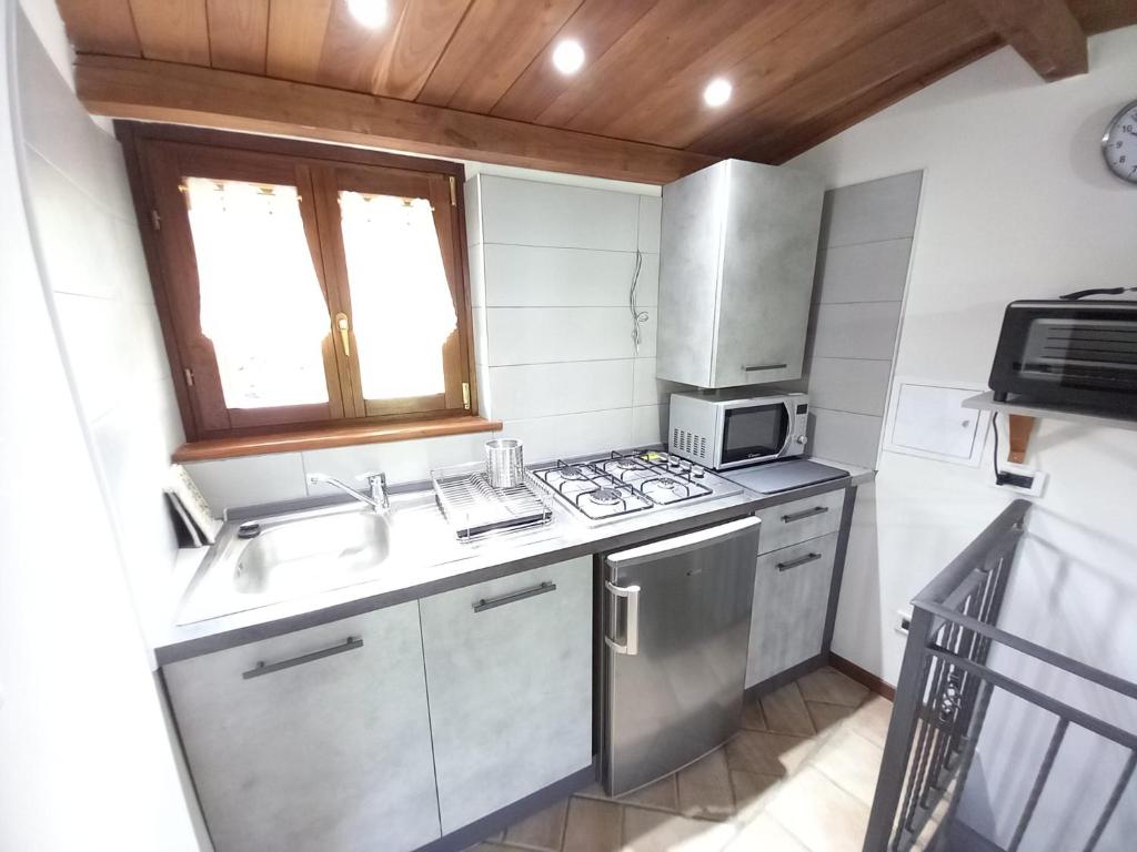 Kuchyň nebo kuchyňský kout v ubytování B&B Monte Tavolino