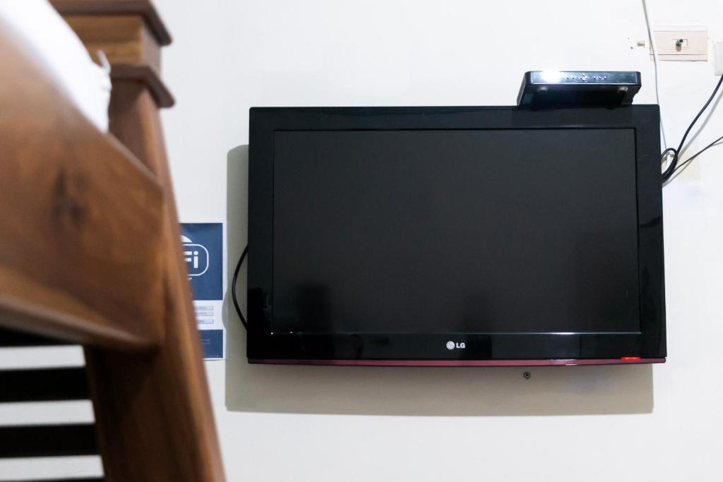 TV a/nebo společenská místnost v ubytování Candileja hostel