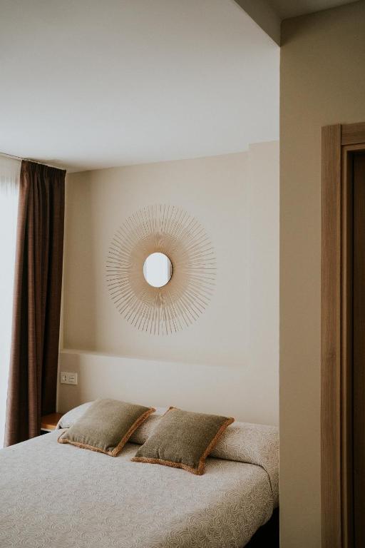Posteľ alebo postele v izbe v ubytovaní Apartamentos Levante - Mares