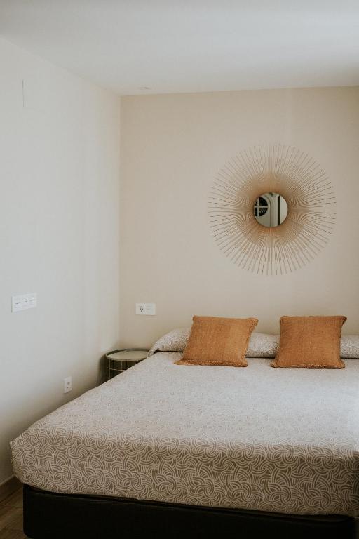 Posteľ alebo postele v izbe v ubytovaní Apartamentos Levante - Mares