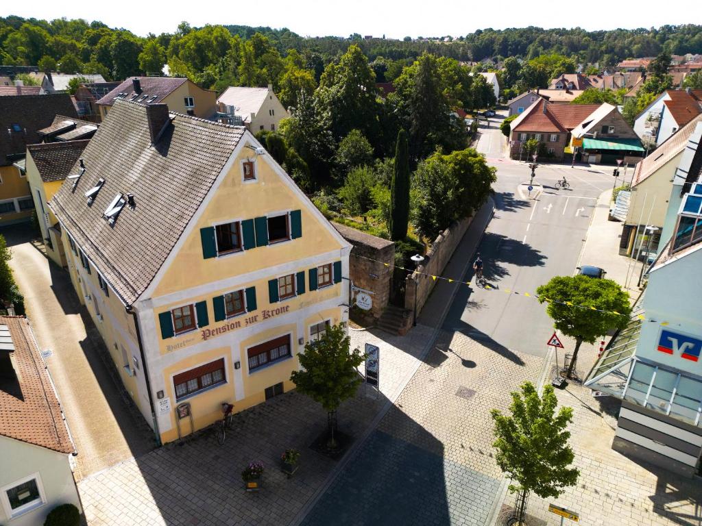 an overhead view of a building in a town at Hotel Garni Pension Zur Krone in Hilpoltstein