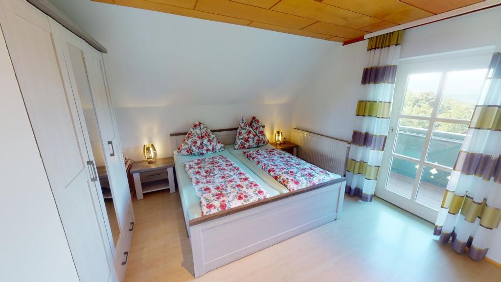 Postel nebo postele na pokoji v ubytování Ferienwohnung Kleissner