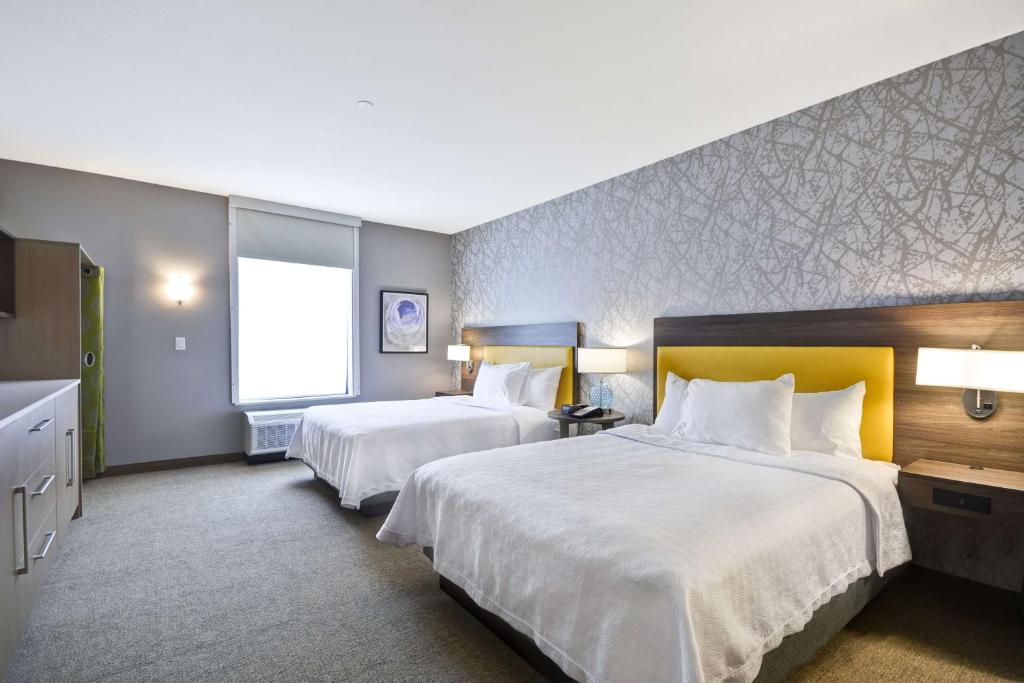 Postel nebo postele na pokoji v ubytování Home 2 Suites By Hilton Fairview Allen
