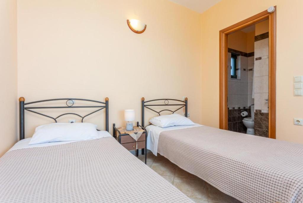 A bed or beds in a room at Villa Valio