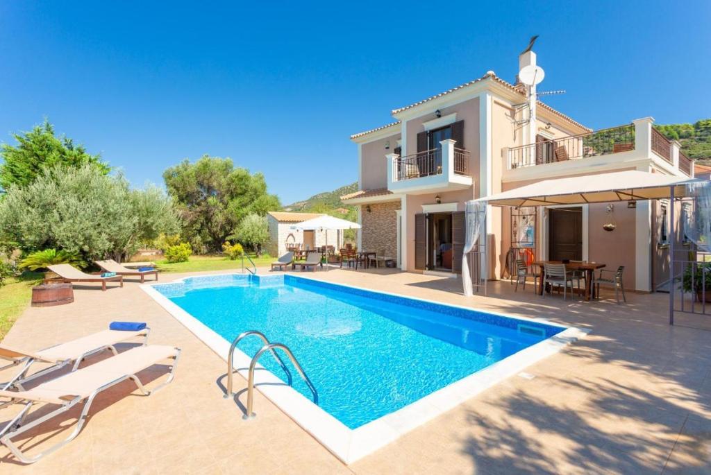 The swimming pool at or close to Villa Eufrosini