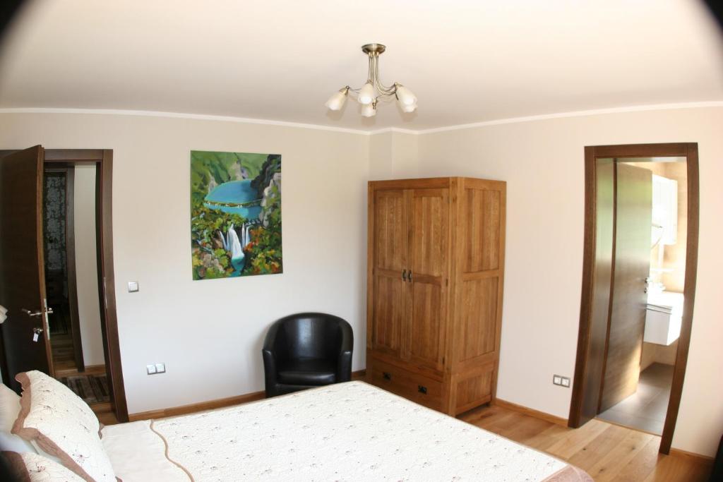 Postel nebo postele na pokoji v ubytování B&B Millenium House
