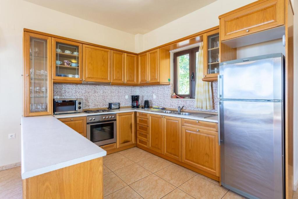 Kuchyň nebo kuchyňský kout v ubytování Villa Selini