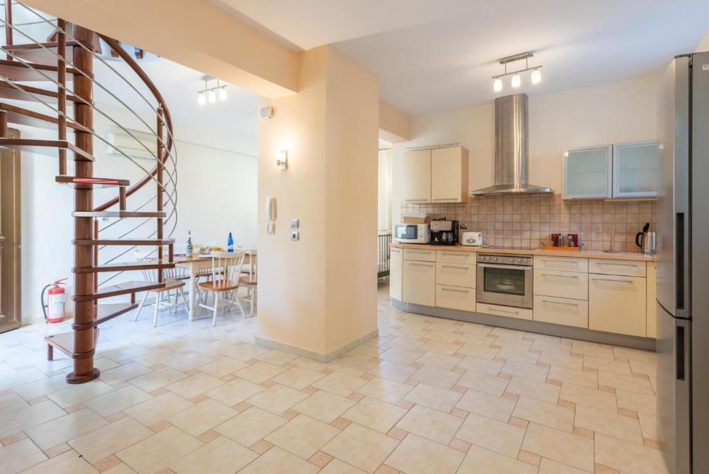Kuchyň nebo kuchyňský kout v ubytování Villa Ismini