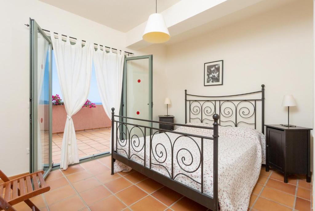 Postel nebo postele na pokoji v ubytování Villa Vali