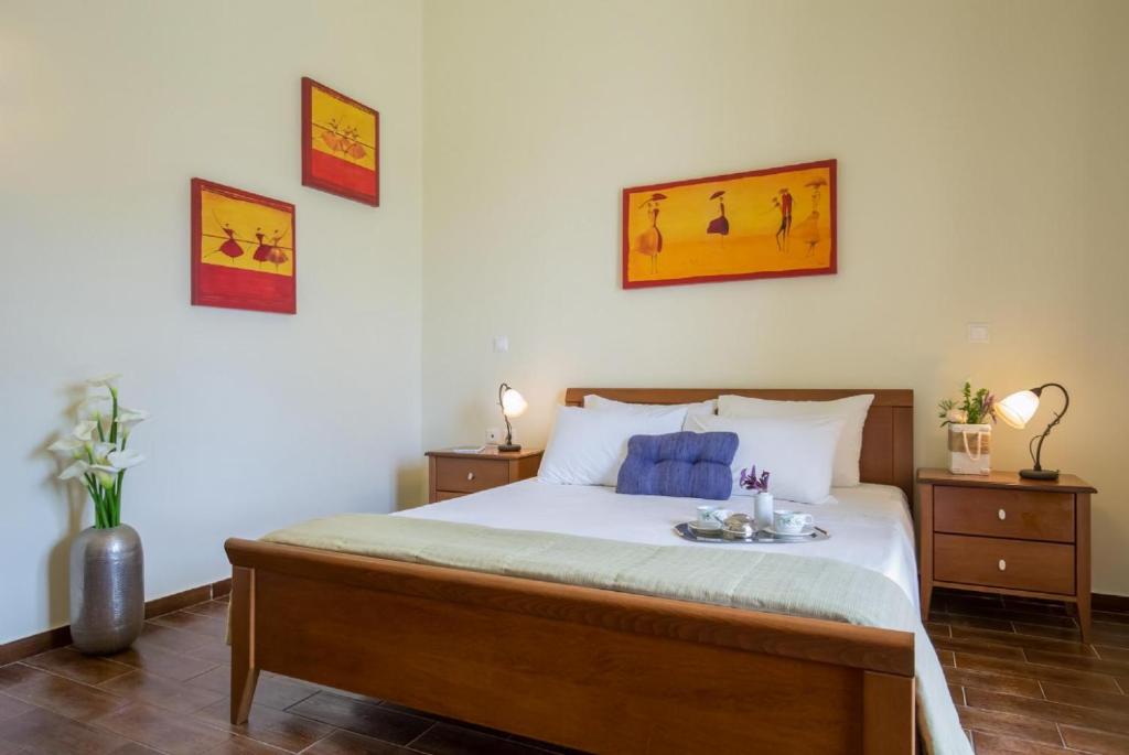 Postel nebo postele na pokoji v ubytování Villa Ilia