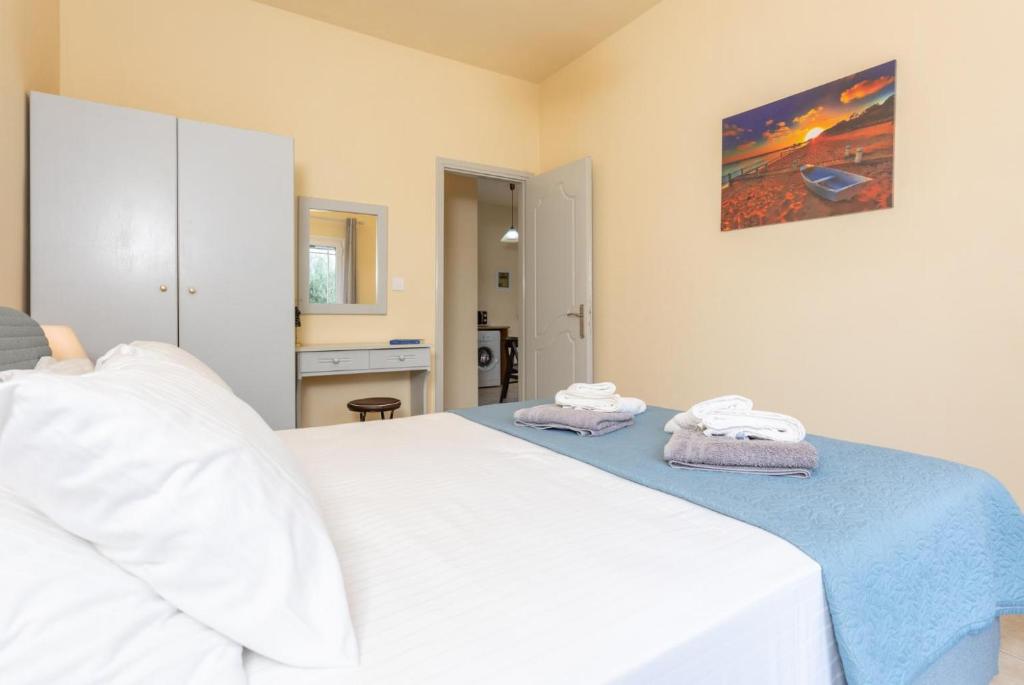 Postel nebo postele na pokoji v ubytování Villa Russa Alexandros
