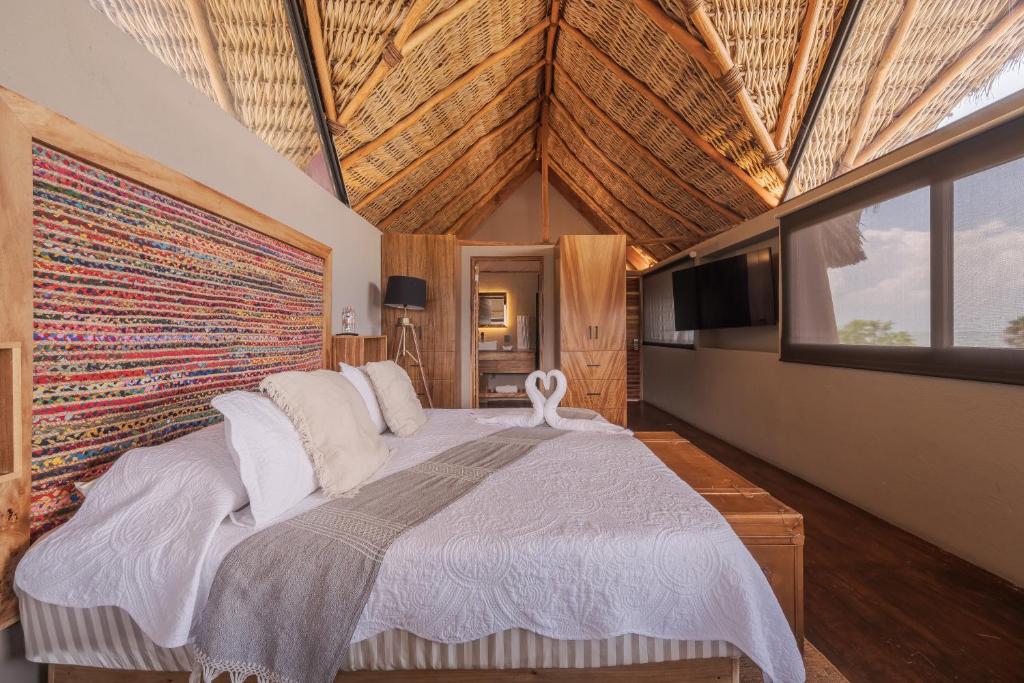 Postel nebo postele na pokoji v ubytování Nimue Marina Residence