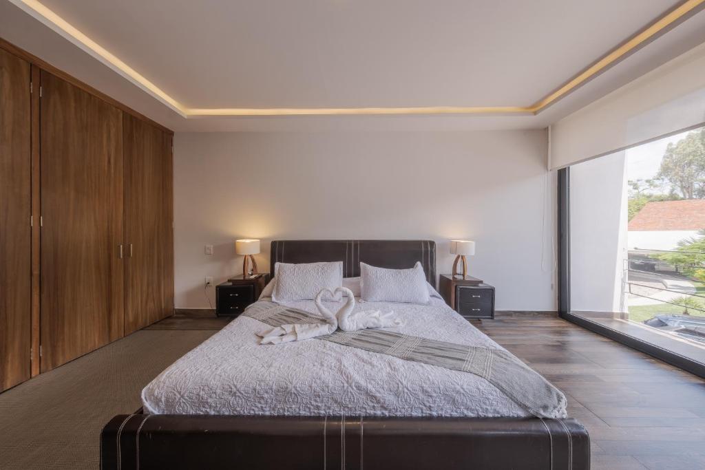 Postel nebo postele na pokoji v ubytování Nimue Marina Residence