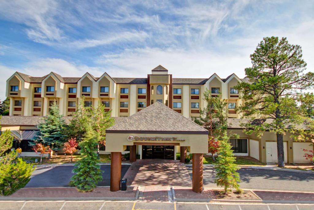 a rendering of a hotel with a building at DoubleTree by Hilton Hotel Flagstaff in Flagstaff