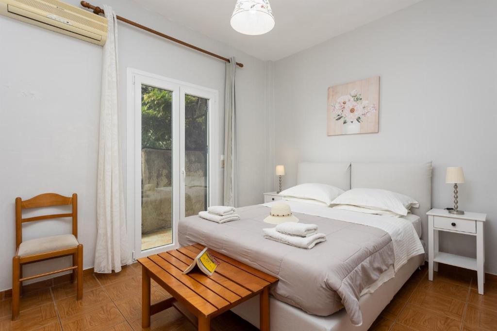 A bed or beds in a room at Michalis