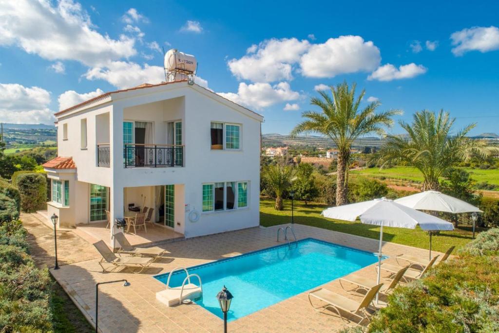 an image of a villa with a swimming pool at Villa Iliada in Polis Chrysochous