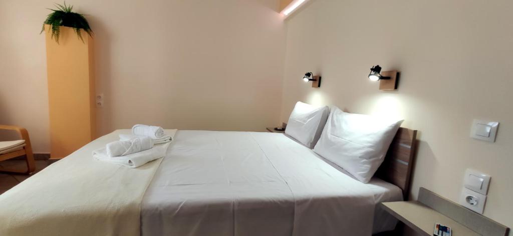 Postel nebo postele na pokoji v ubytování Ellora Suite