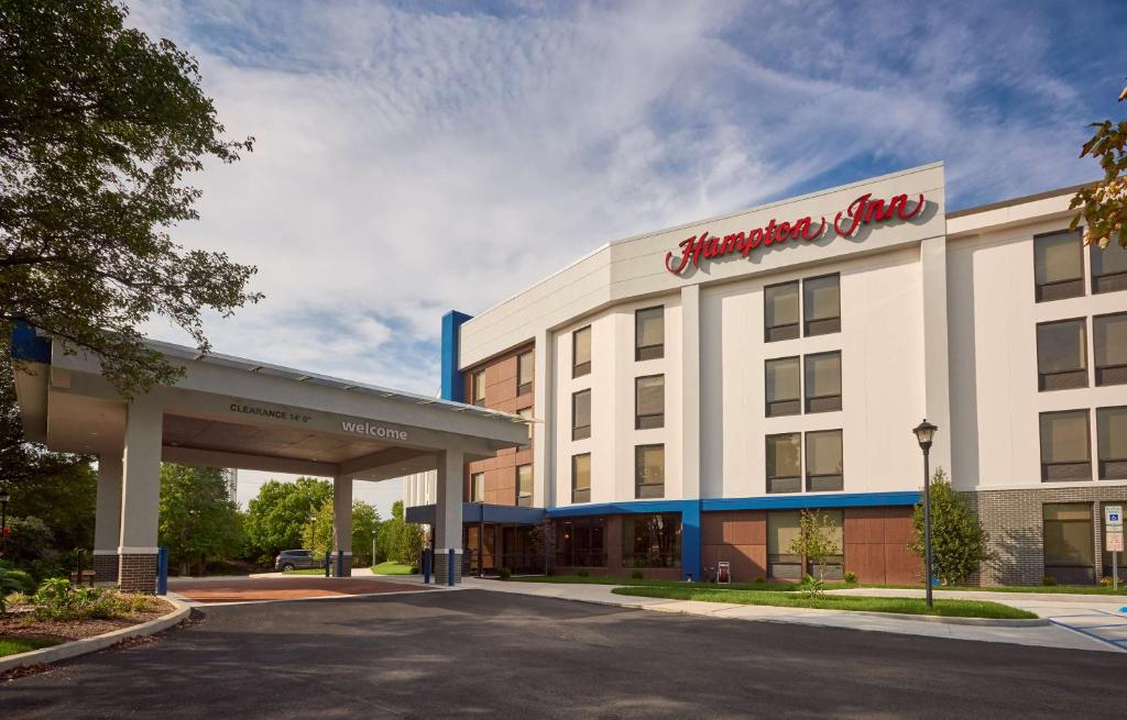 a rendering of a hotel with a gas station at Hampton Inn by Hilton Harrisburg West in Mechanicsburg