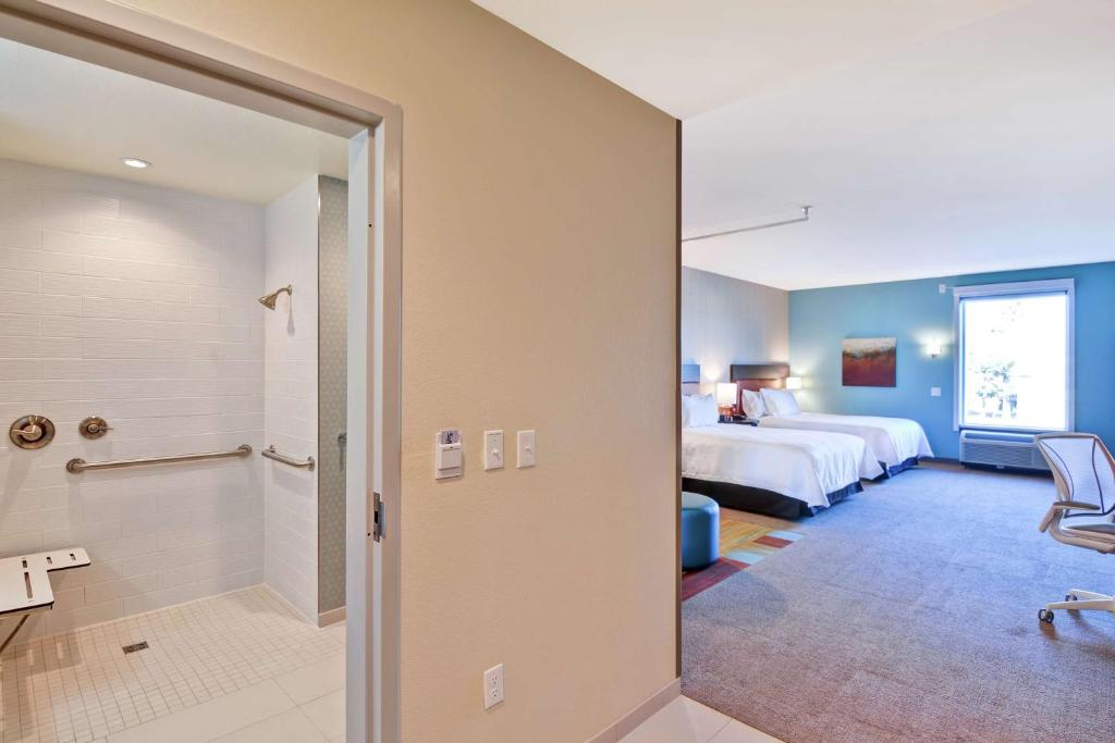 Postel nebo postele na pokoji v ubytování Home2 Suites By Hilton Las Vegas Strip South