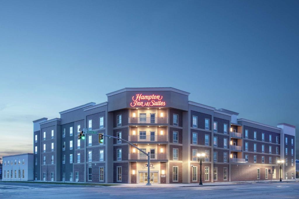 una rappresentazione di un edificio con un cartello sopra di Hampton Inn And Suites Logan, Ut a Logan