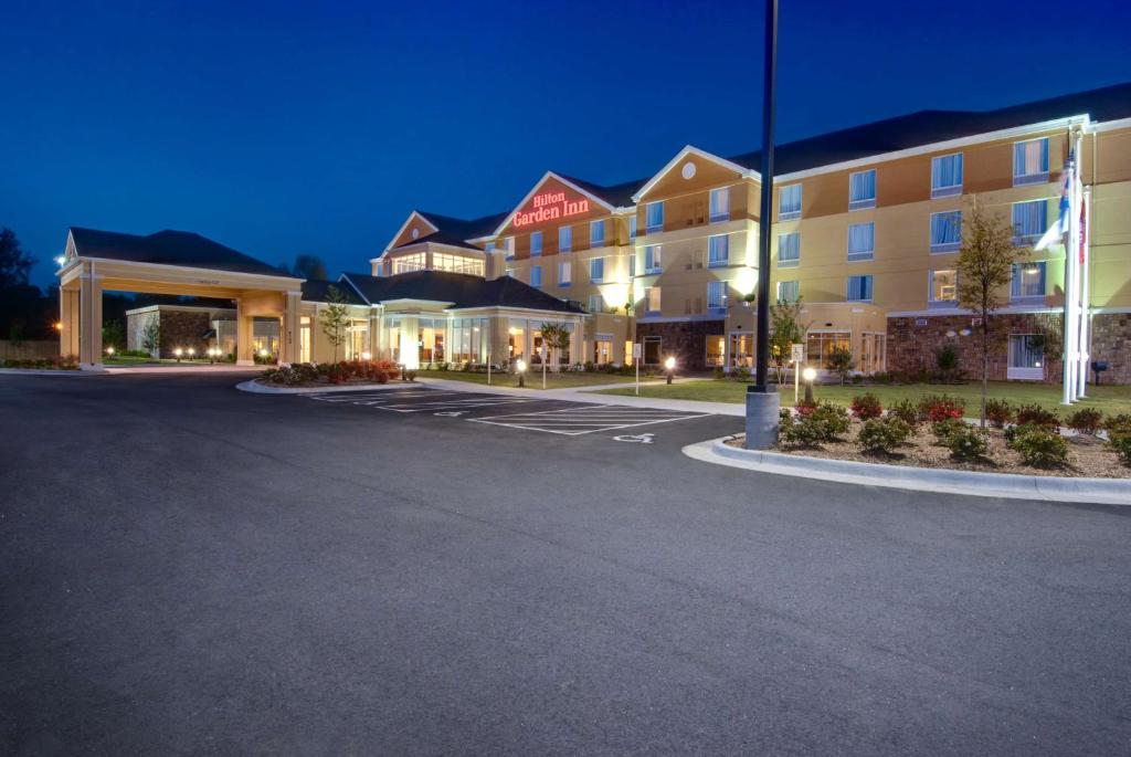 an empty parking lot in front of a hotel at Hilton Garden Inn North Little Rock in North Little Rock