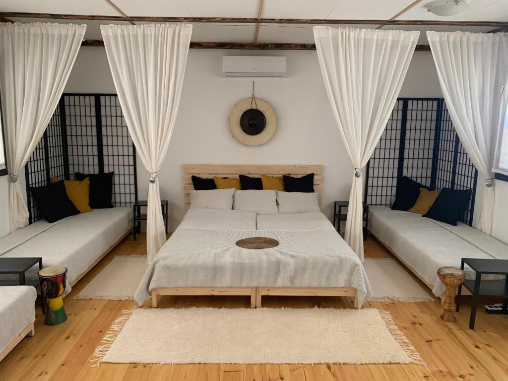 Säng eller sängar i ett rum på Gong Faház - Eger