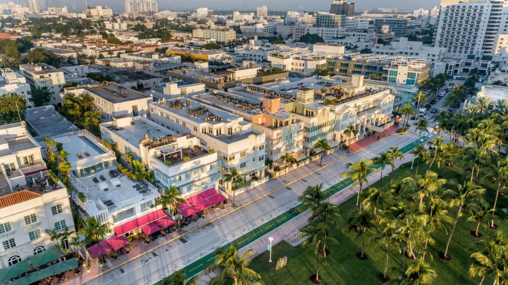 an aerial view of a city with palm trees and buildings at Hilton Vacation Club Crescent on South Beach Miami in Miami Beach