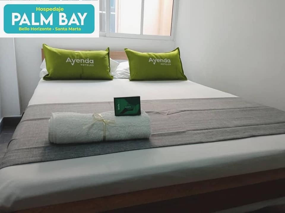 Postel nebo postele na pokoji v ubytování Aw Hotel Palm Bay Bello Horizonte