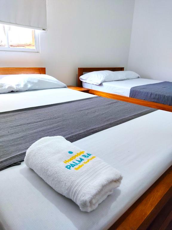 Postel nebo postele na pokoji v ubytování Aw Hotel Palm Bay Bello Horizonte