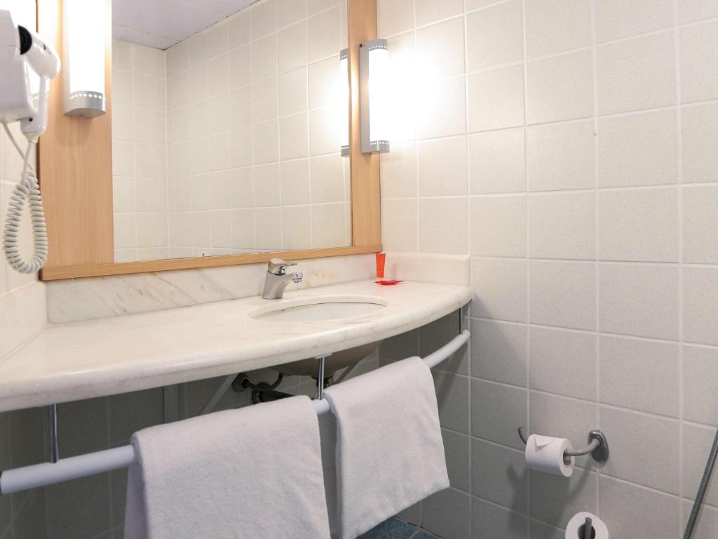 Um banheiro em ibis Sao Paulo Congonhas