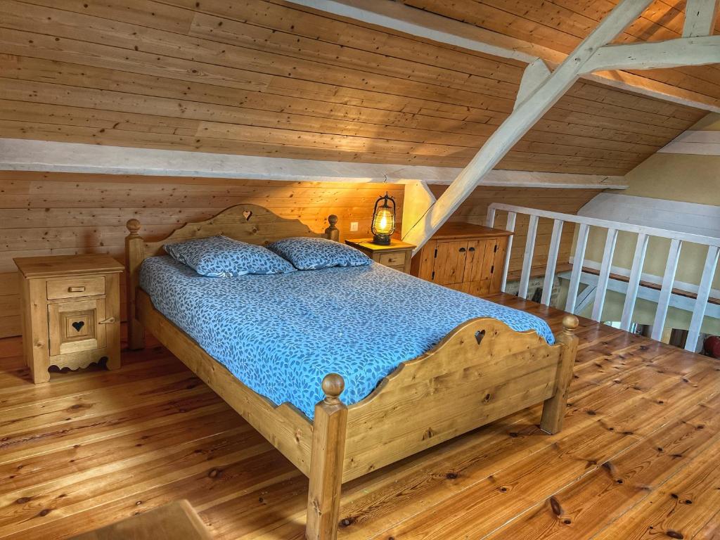 Postel nebo postele na pokoji v ubytování Gite du lac du Palentin Ardres
