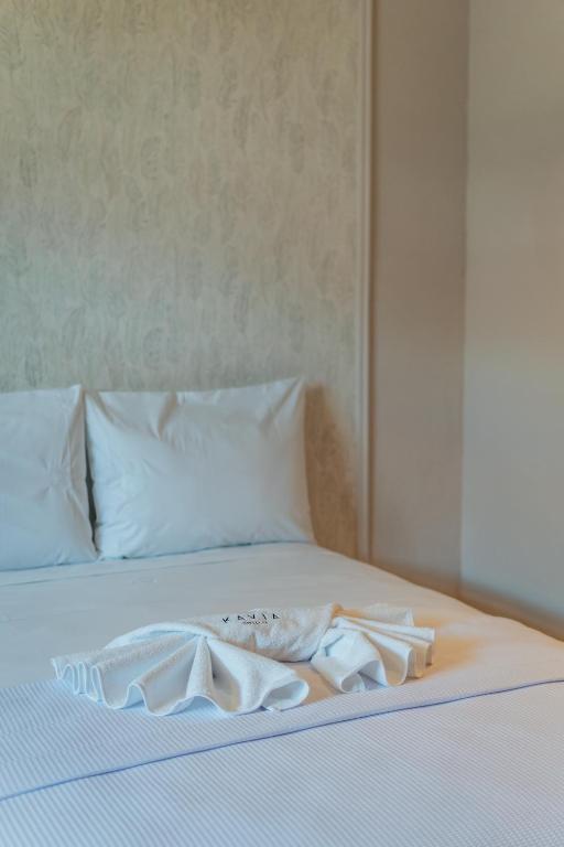 Postel nebo postele na pokoji v ubytování Hotel MID Project
