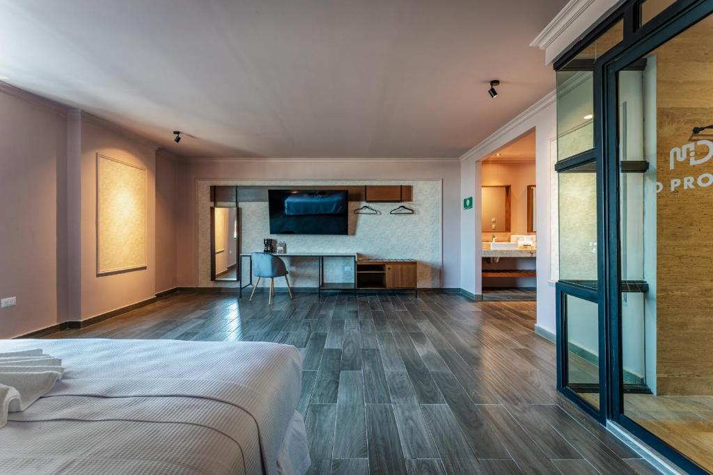 Postel nebo postele na pokoji v ubytování Hotel MID Project