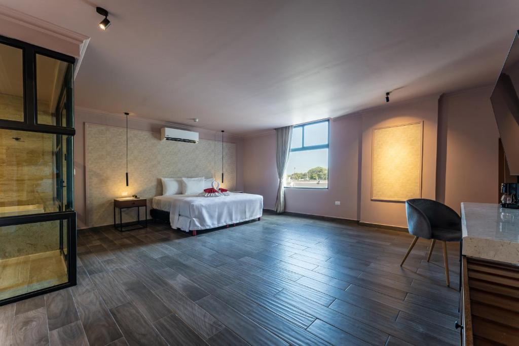 Postel nebo postele na pokoji v ubytování Hotel MID Project